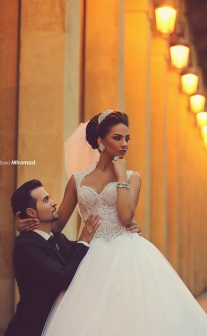 gorgeous cap sleeve tulle lace wedding dress with train