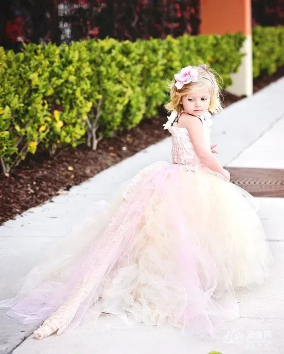 Lovely Sleeveless Tulle Flower Girl Dress With Long Train And Flowers