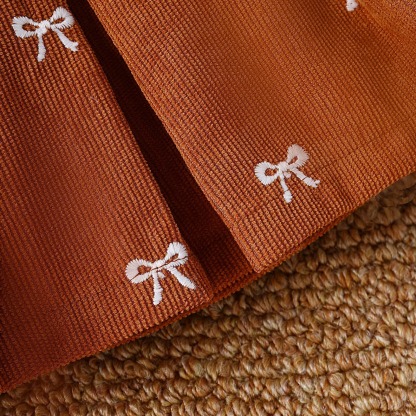 2pcs Toddler Girls White Ribbed Top And Printed Mini Skirt