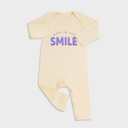 Baby romper featuring Smiley Face design in Light Yellow