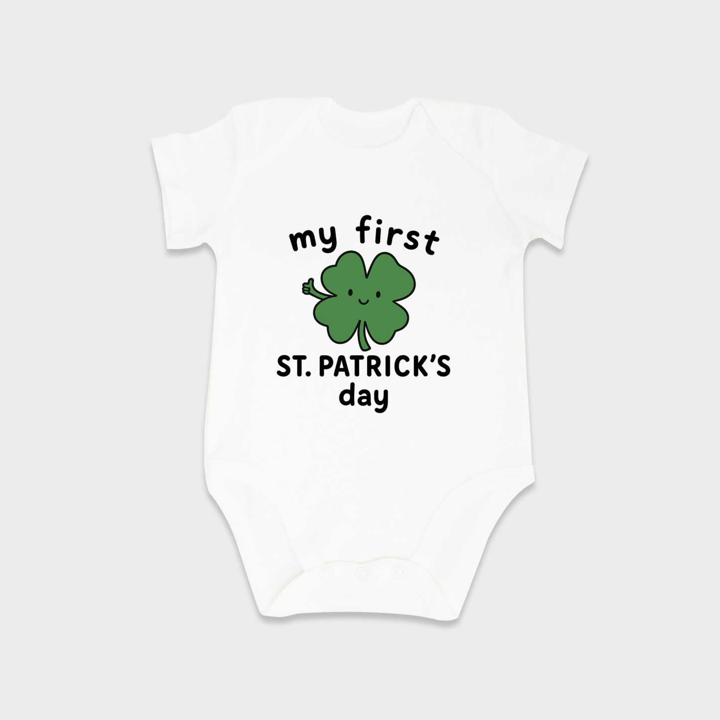 St Patrick's Day baby onesies in White