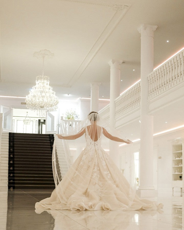 Sexy A-Line Deep V-Neck Spaghetti Strap Floor-Length Backless Wedding Dress with Lace Appliques