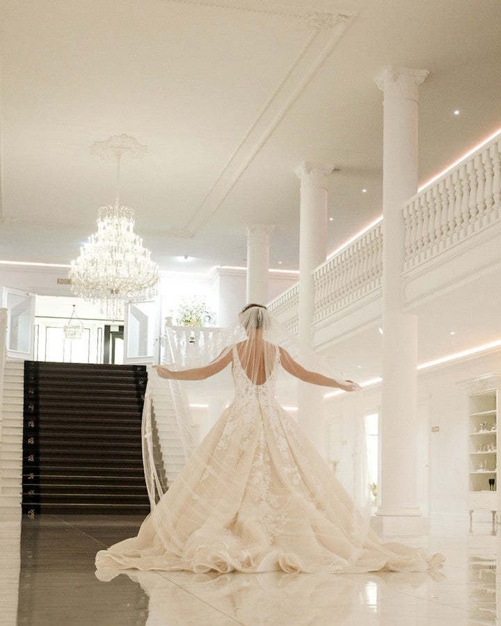 Sexy A-Line Deep V-Neck Spaghetti Strap Floor-Length Backless Wedding Dress with Lace Appliques
