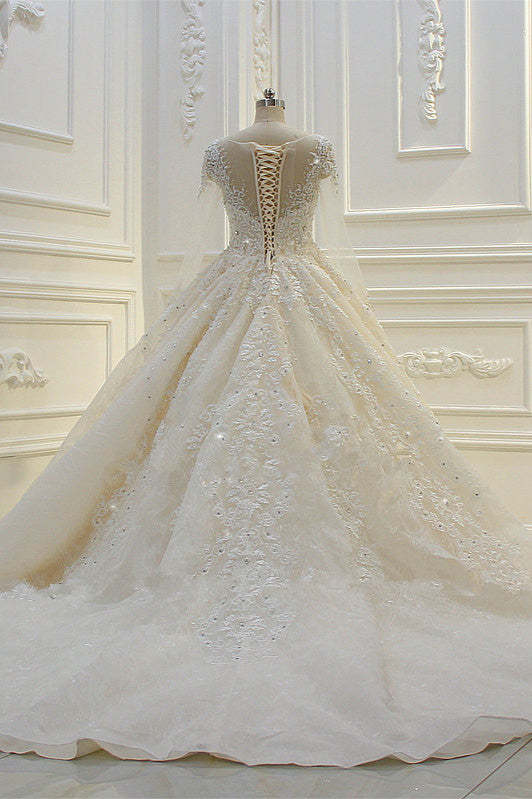 Bateau Long Sleeve Beaded Ball Gown Wedding Dress with Lace Appliques