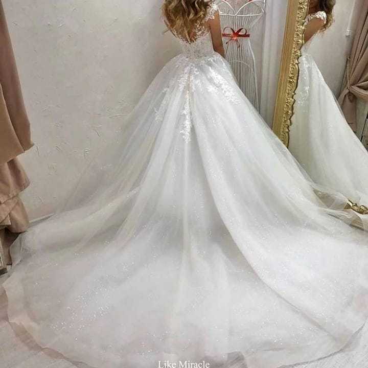Sweetheart Off-the-Shoulder A-Line Wedding Dress with Train, Tulle, and Lace Appliques