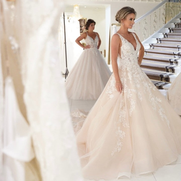 Sexy A-Line Deep V-Neck Spaghetti Strap Floor-Length Backless Wedding Dress with Lace Appliques