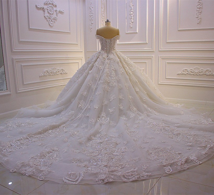 Off-the-shoulder A-Line Wedding Dress With Long Sleeves Appliques