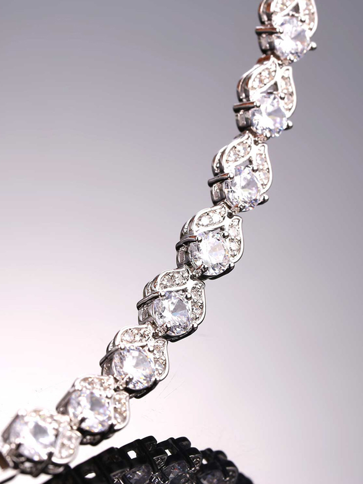 Tennis Chain Flower Bracelet with CZ in Platinum Plated