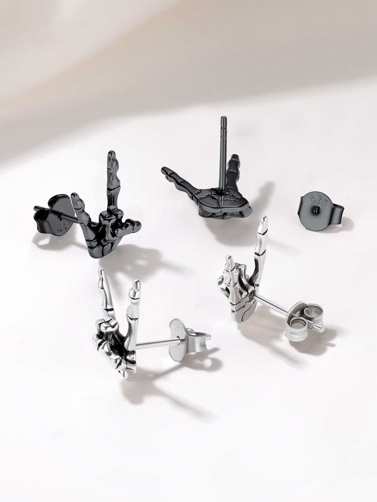 Rock Skull Hand Stud Earrings in Black Plated