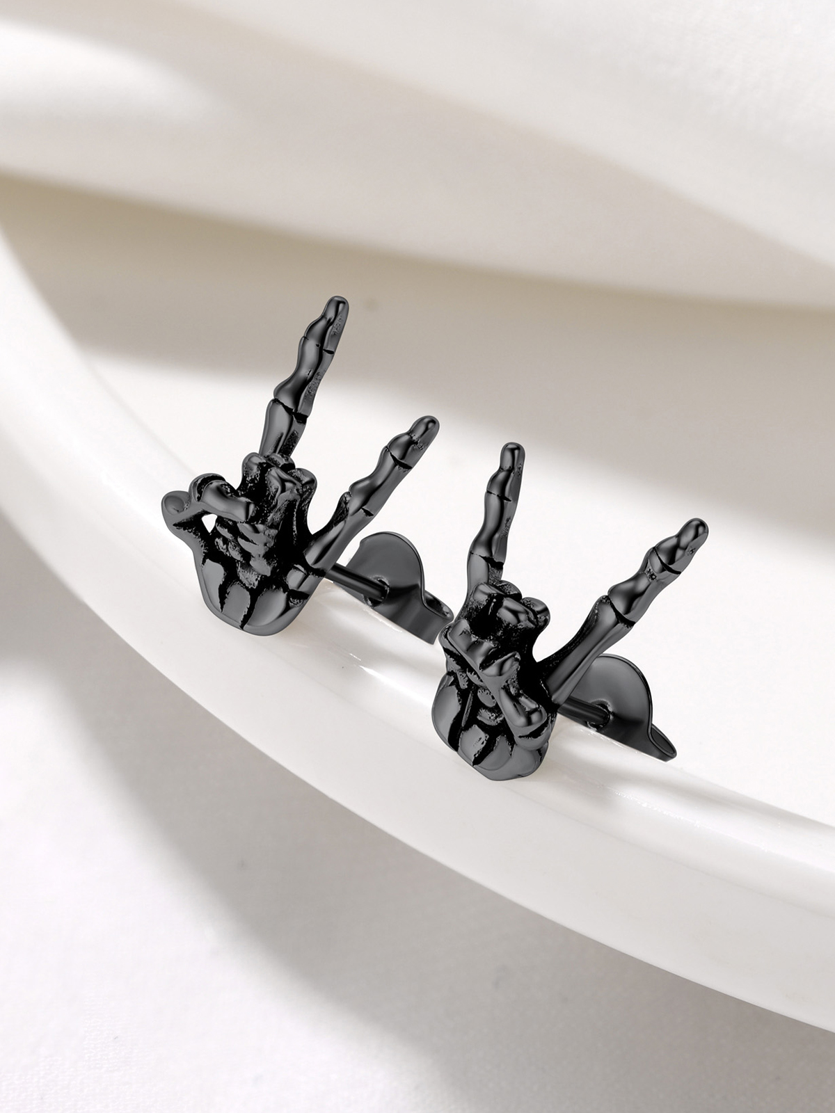 Rock Skull Hand Stud Earrings in Black Plated