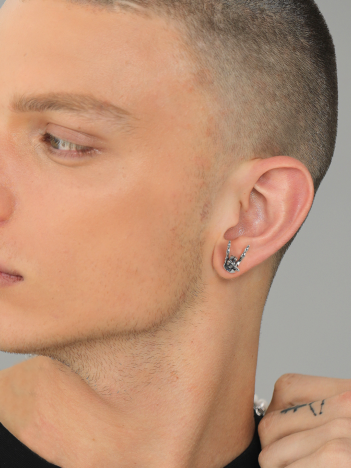 Rock Skull Hand Stud Earrings in Silver