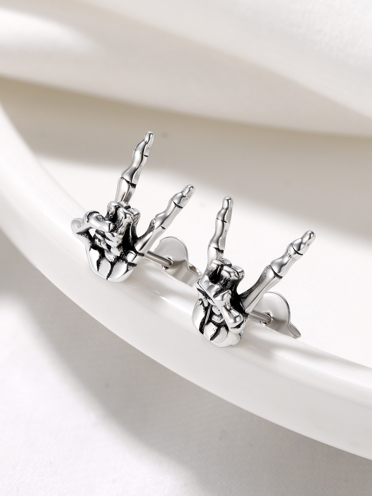 Rock Skull Hand Stud Earrings in Silver