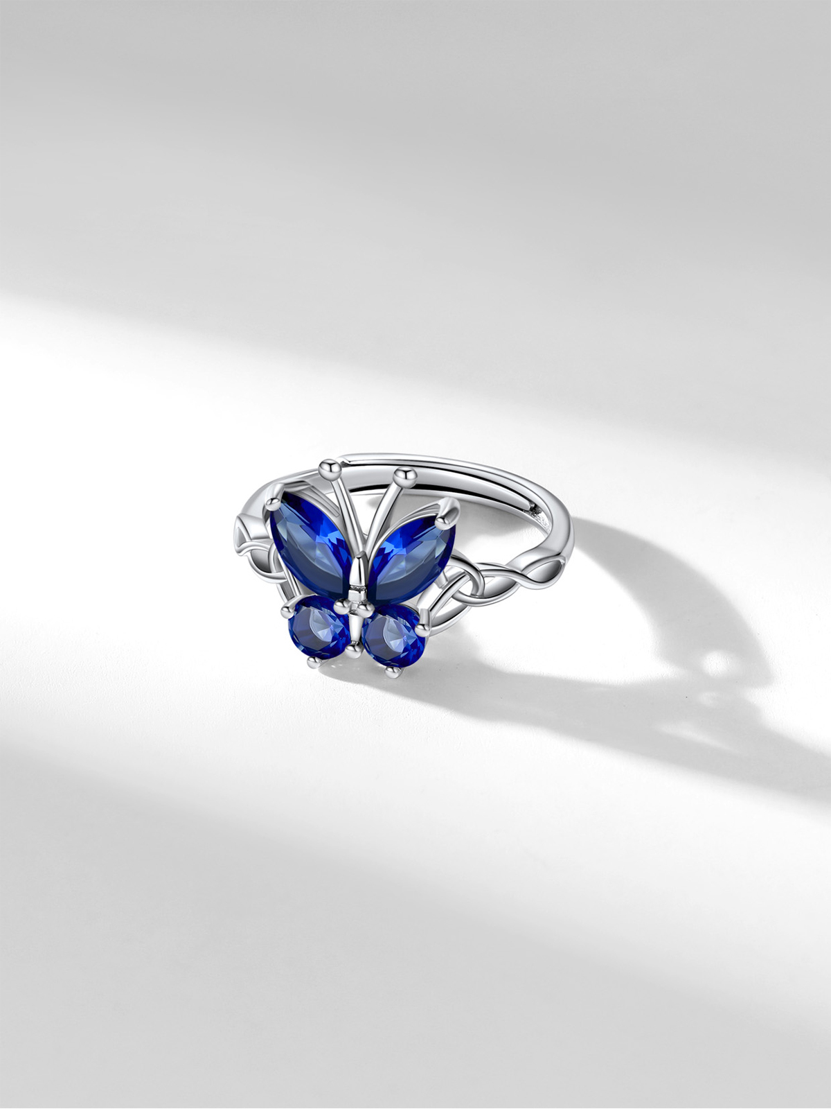 Adjustable Synthetic Sapphire Celtic Knot Band Butterfly Ring