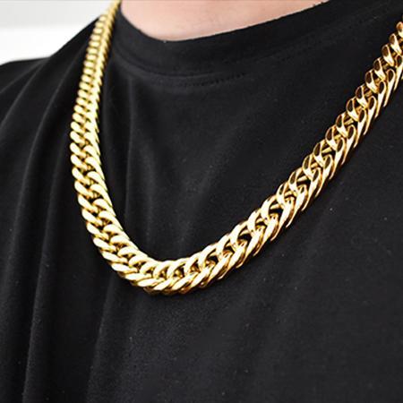 Gold Miami Cuban chain necklace on a man's neck