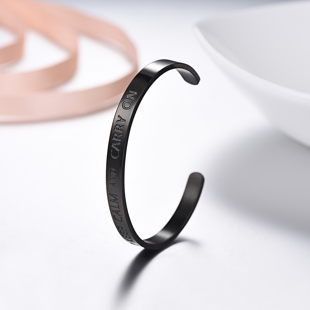 Black stainless steel cuff bracelet with slogan