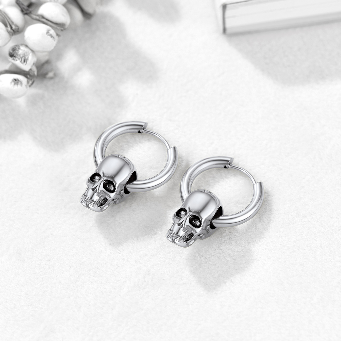 Pierced Skull Dangle Earrings