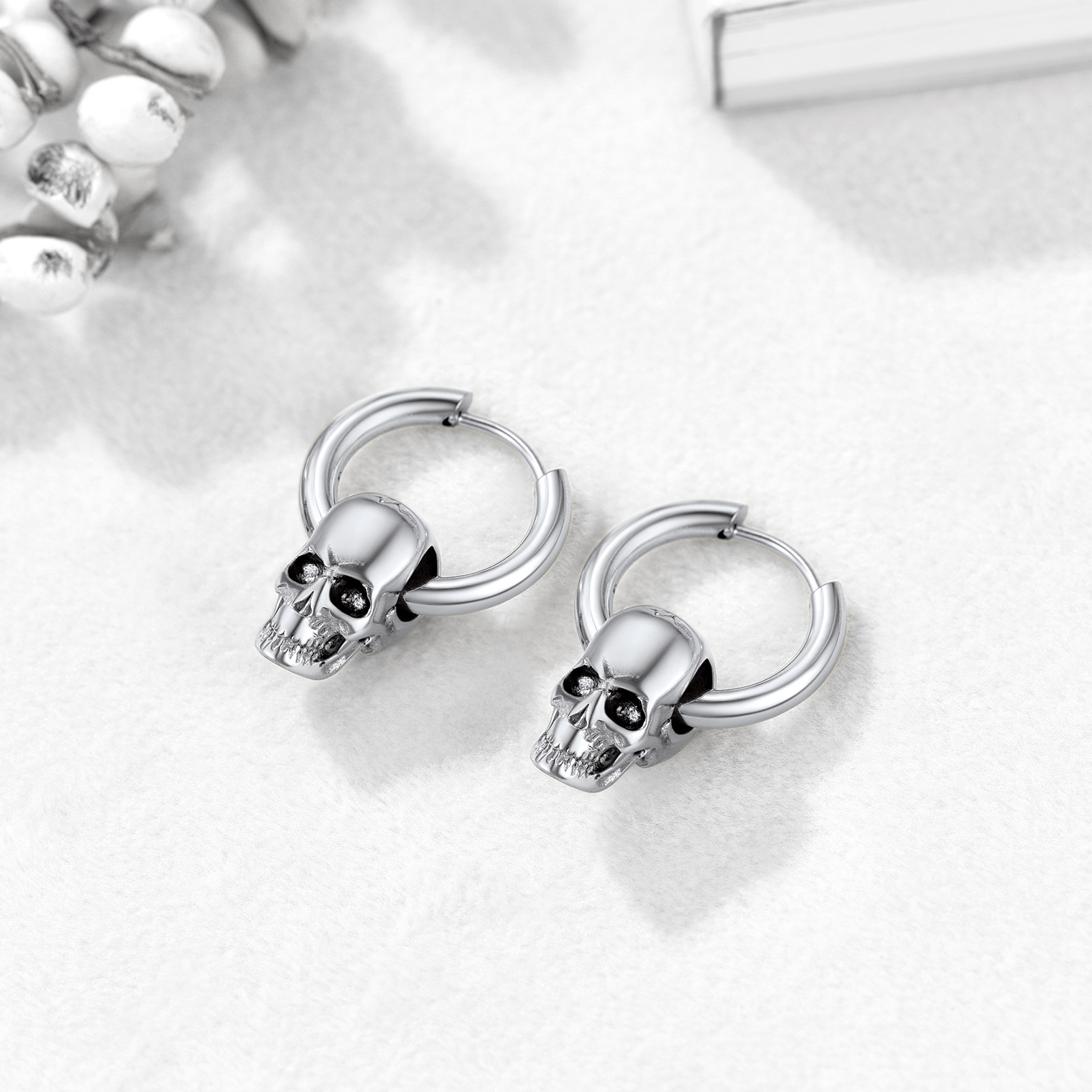 Pierced Skull Dangle Earrings