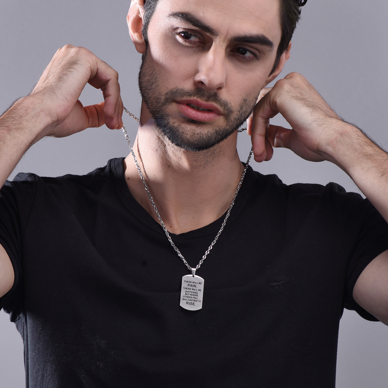 Bible verse necklace styled on male model