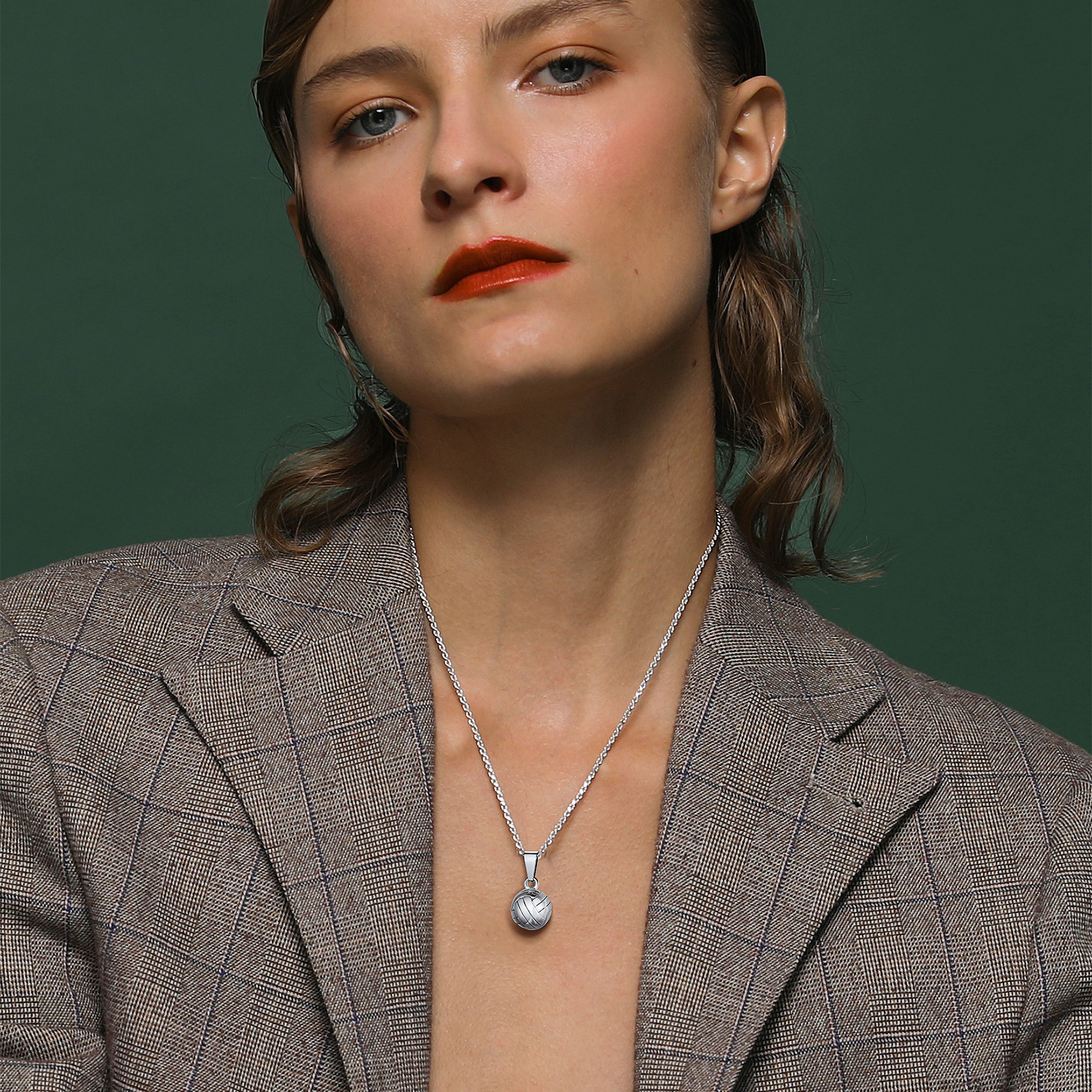 Woman wearing STEEL volleyball pendant necklace elegant look
