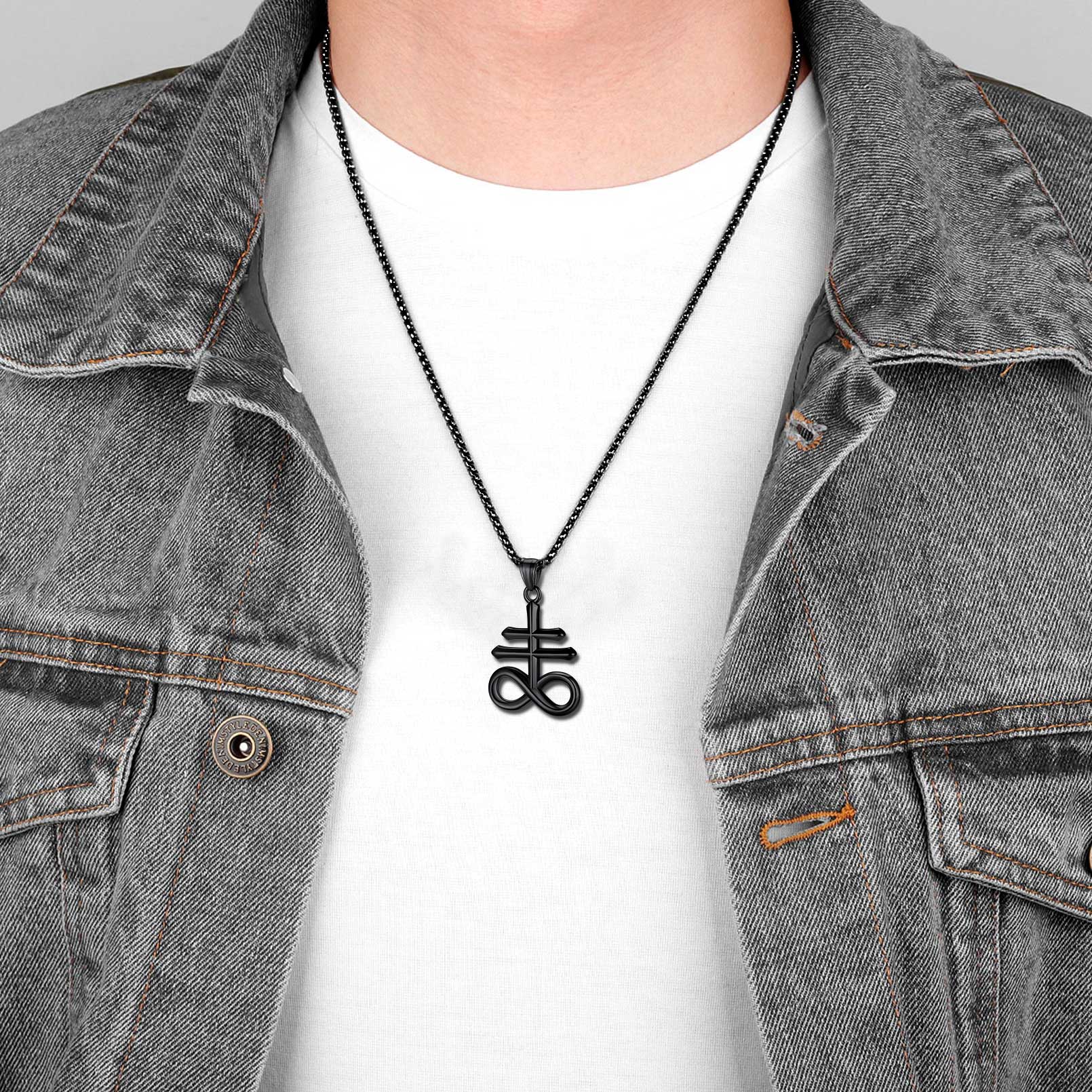 Man wearing black Leviathan Cross necklace casual outfit