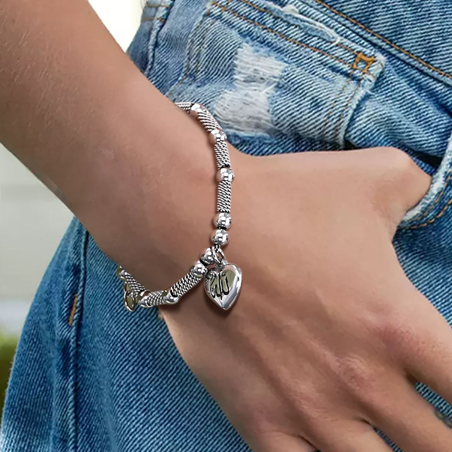 Allah heart beads bracelet on woman wrist