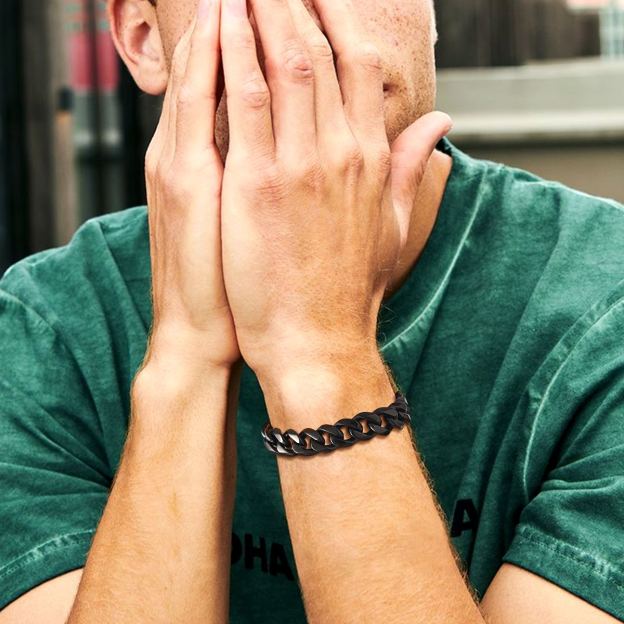 Black Cuban Bracelet on Green T-Shirt Wrist