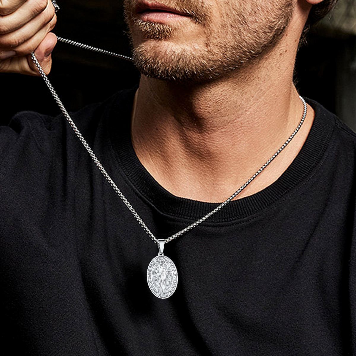 St Benedict Necklace on Model Adjusting Chain Men Fashion