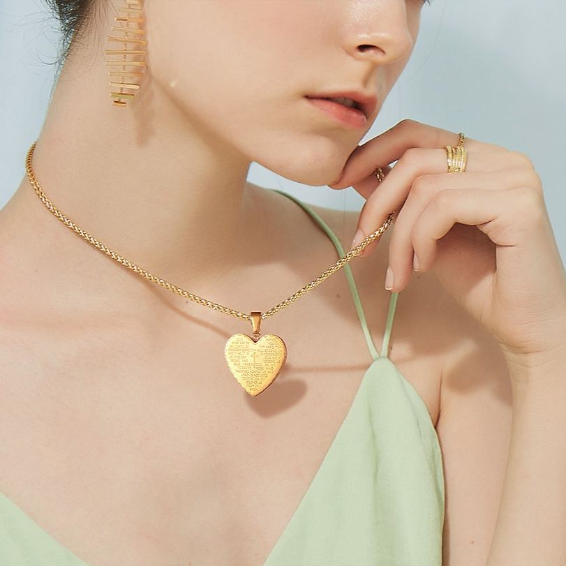 Gold Heart Bible Verse Necklace on Woman