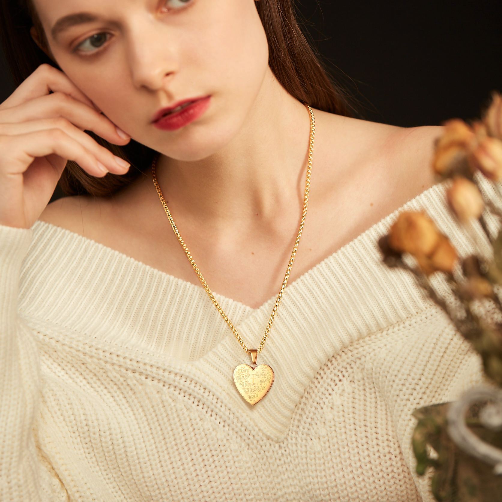 Gold Heart Pendant Necklace on White Sweater