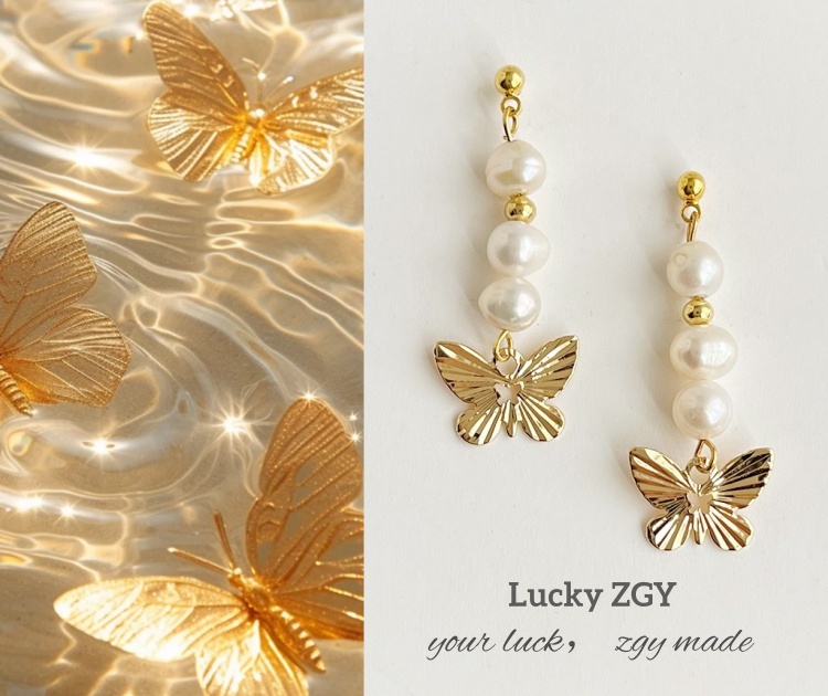Gold butterfly pearl pendant earrings