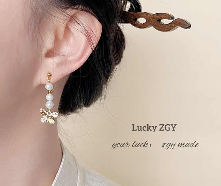 Gold butterfly pearl pendant earrings