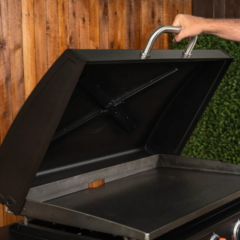 The 36" griddle hood being opened to show the reinforced X bracing structure