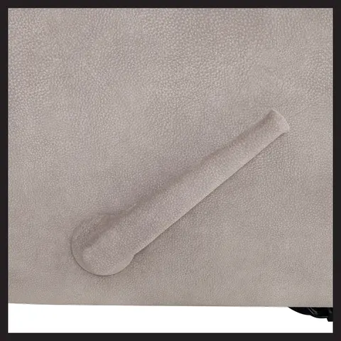 Side image of the recliner featuring the manual handle to recline