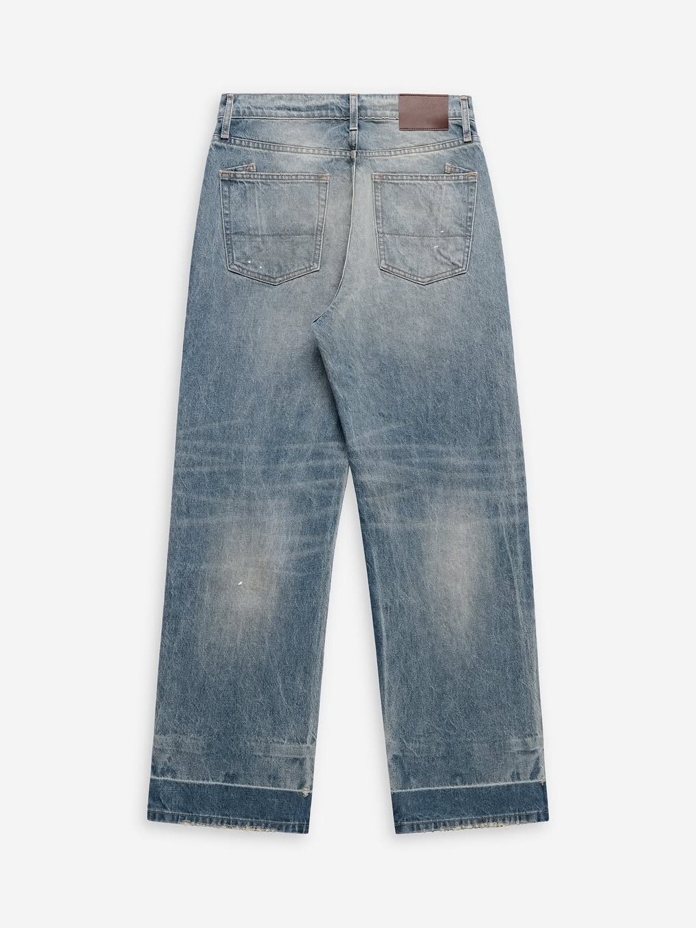 DISTRESSED PATCH JEANS