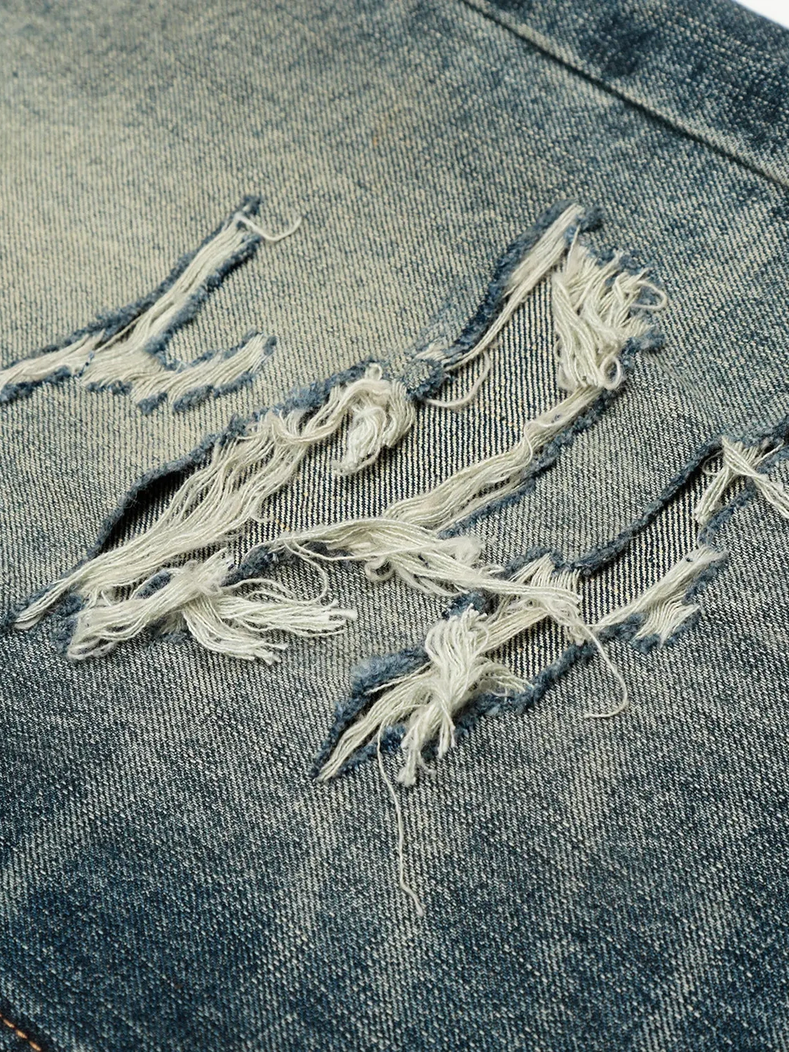 VINTAGE DISTRESSED BAGGY JEANS