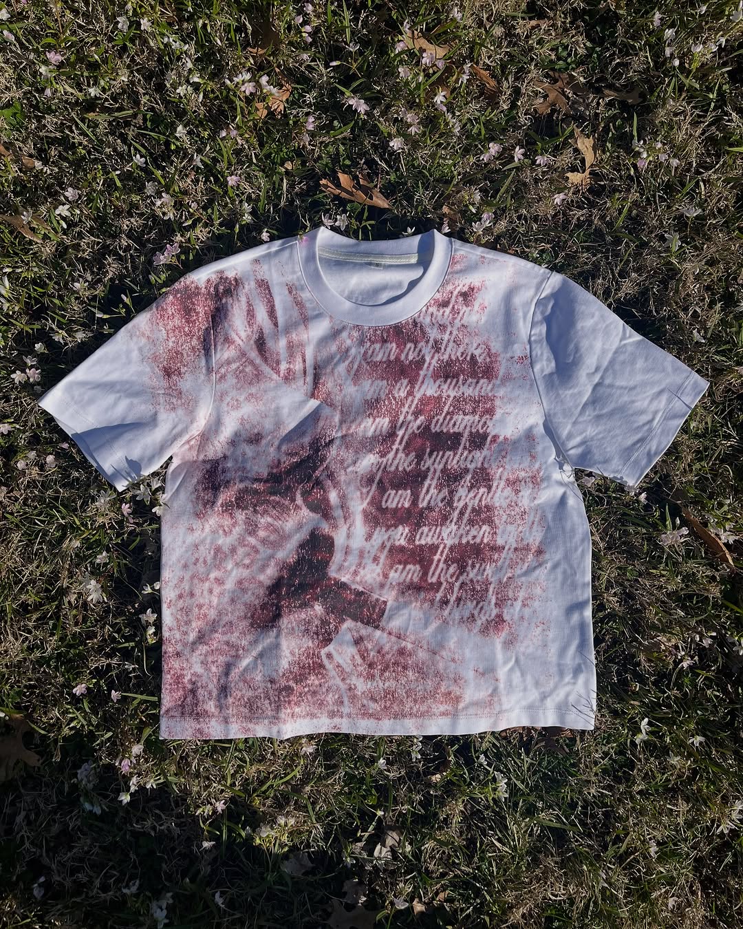 "WHISPER" TEE