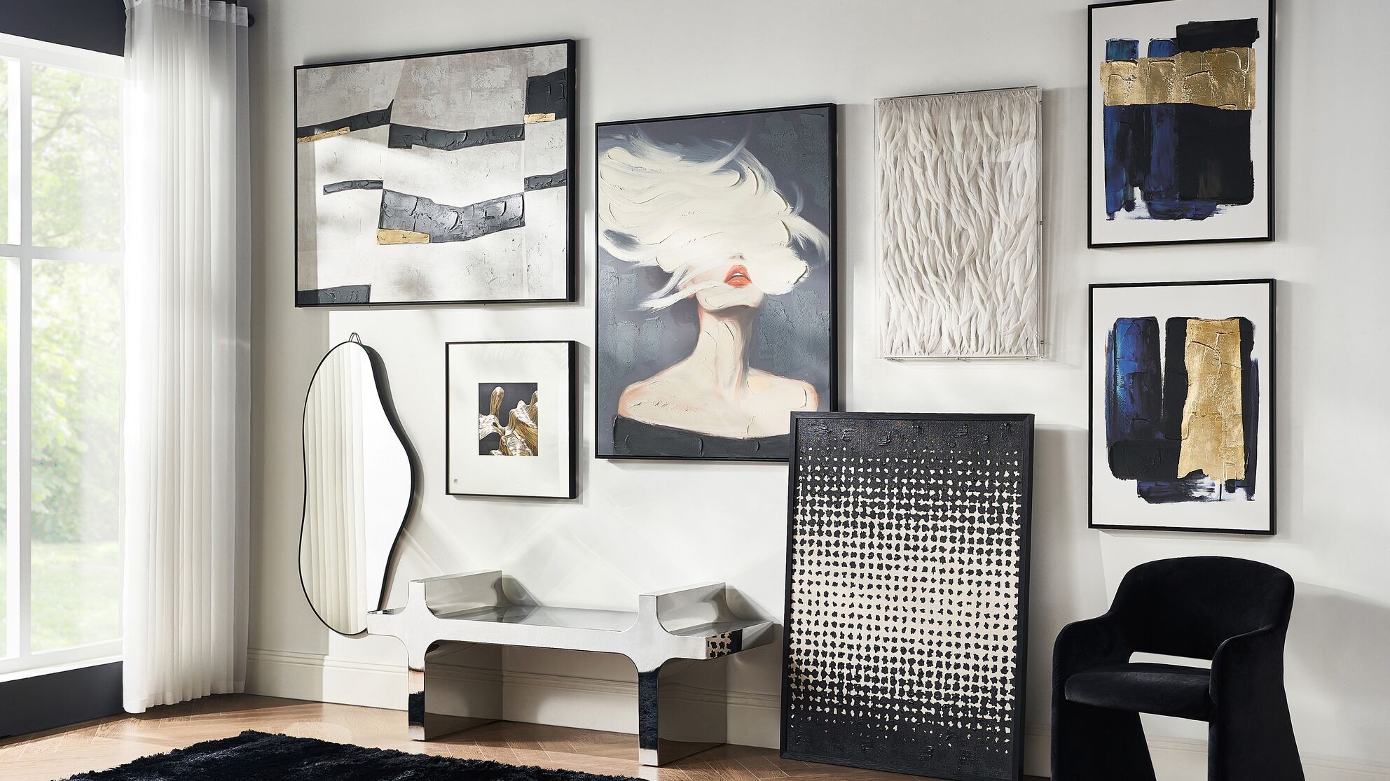 Layered artwork, sculptural form, and tonal contrast turn the wall into a statement of modern curation.