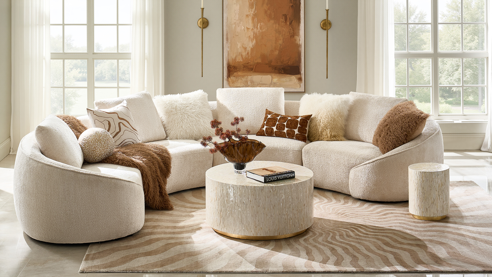 Curved silhouettes and rich texture bring warmth, polish, and a quietly striking presence.