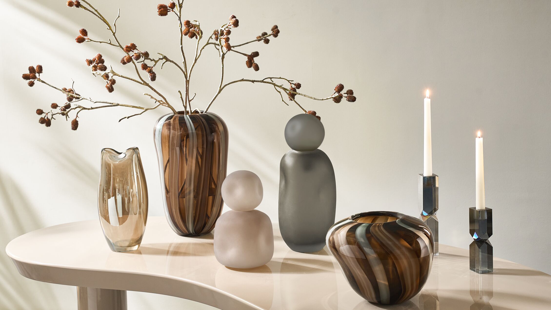 <p style='color:black'>A curated expression of modern glamour.</p>