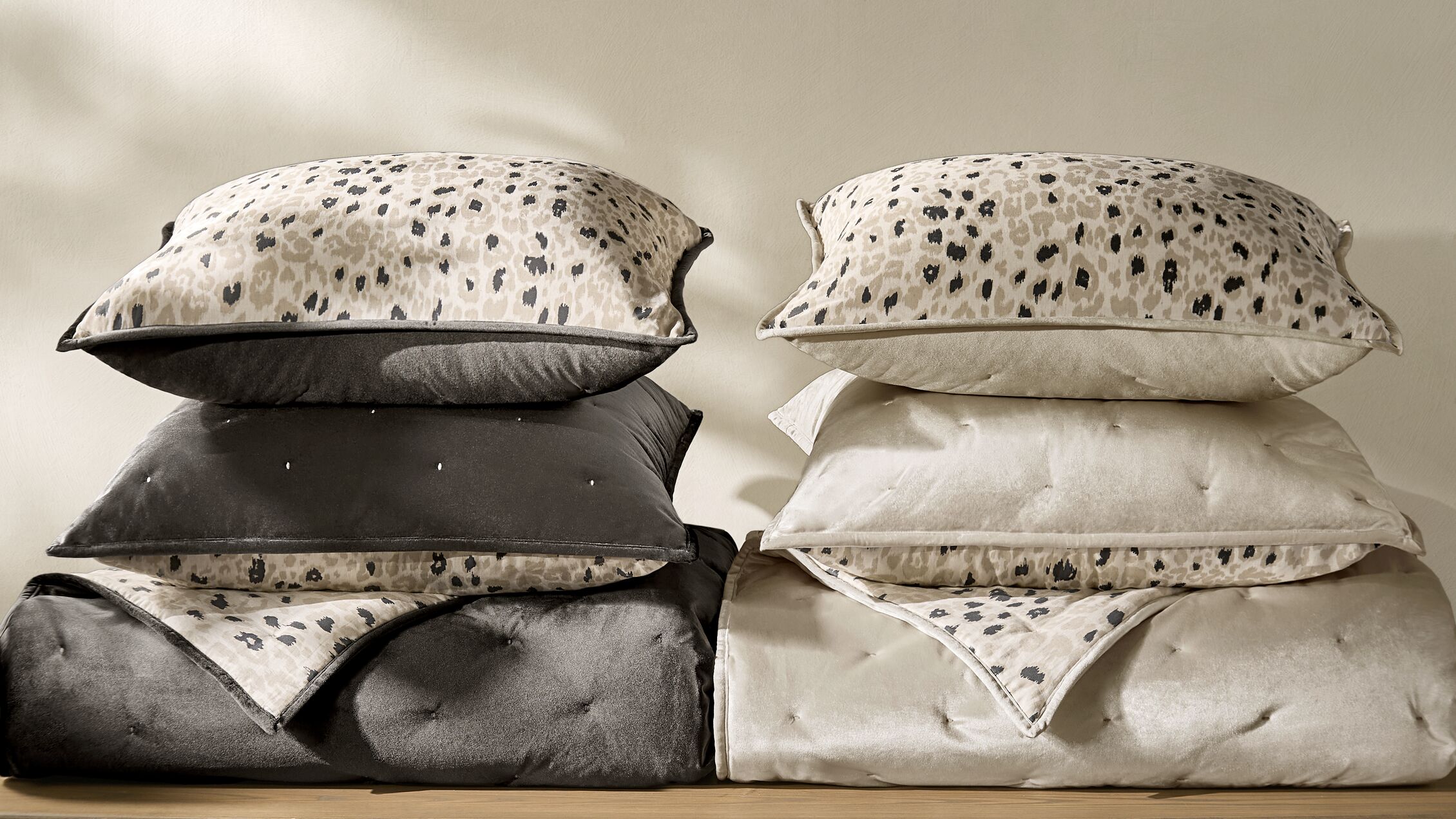 A quieter take on animal print, softened in ivory, charcoal, and touchable texture.