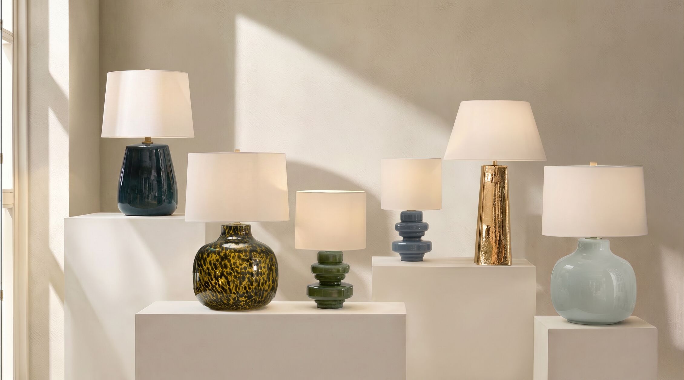 Tortoise glass, sea-blue glaze, and hammered gold bring depth to the everyday glow.