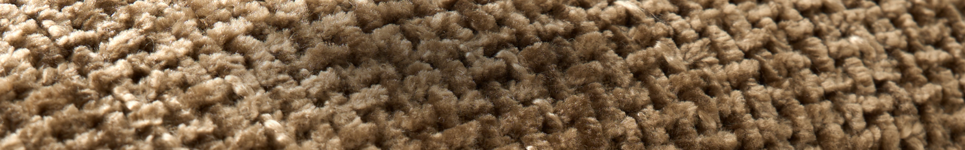 Close-up texture of a plush neutral beige carpet background for clearance promotion banner.