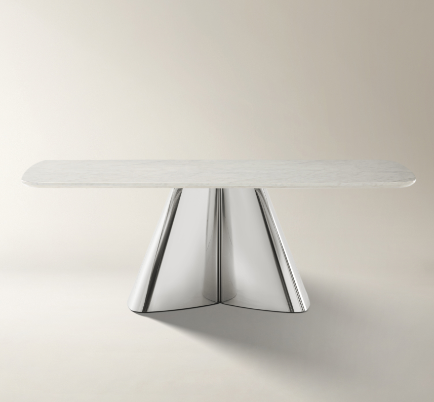 Matera marble dining table with polished stainless steel base, featured next to furniture care tips.