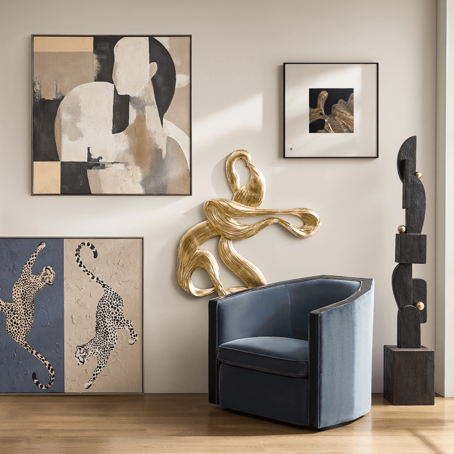 Modern gallery wall featuring framed abstract paintings, leopard artwork, a metallic ribbon sculpture, and a dark blue velvet swivel chair.