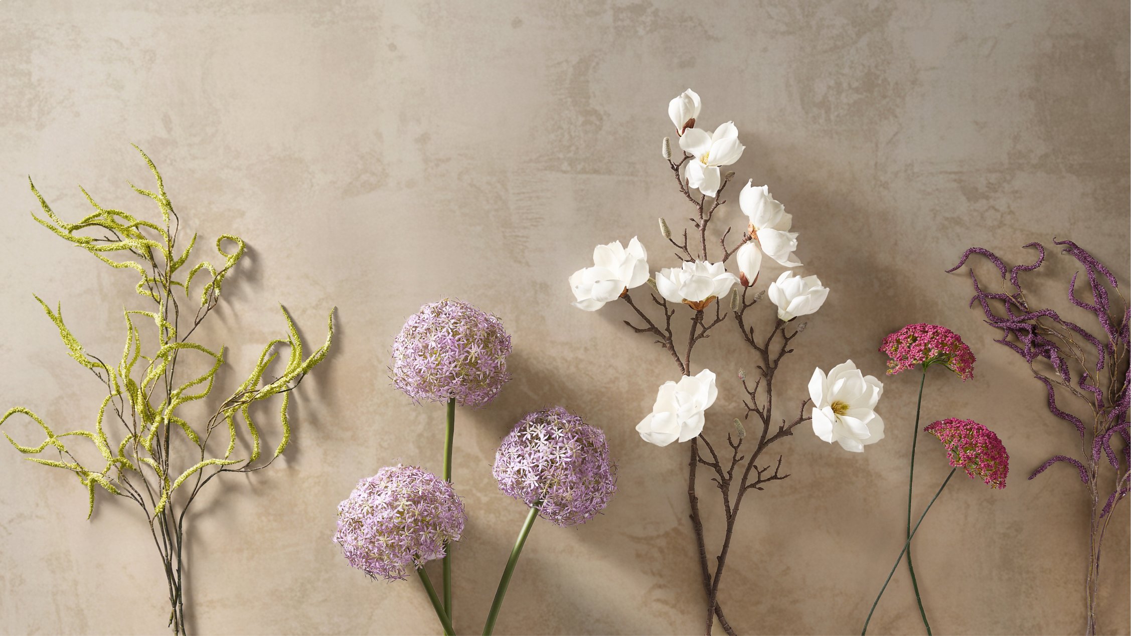 <p style='color:black'>Sculptural florals designed to bring romance, movement, and atmosphere into the room.</p>