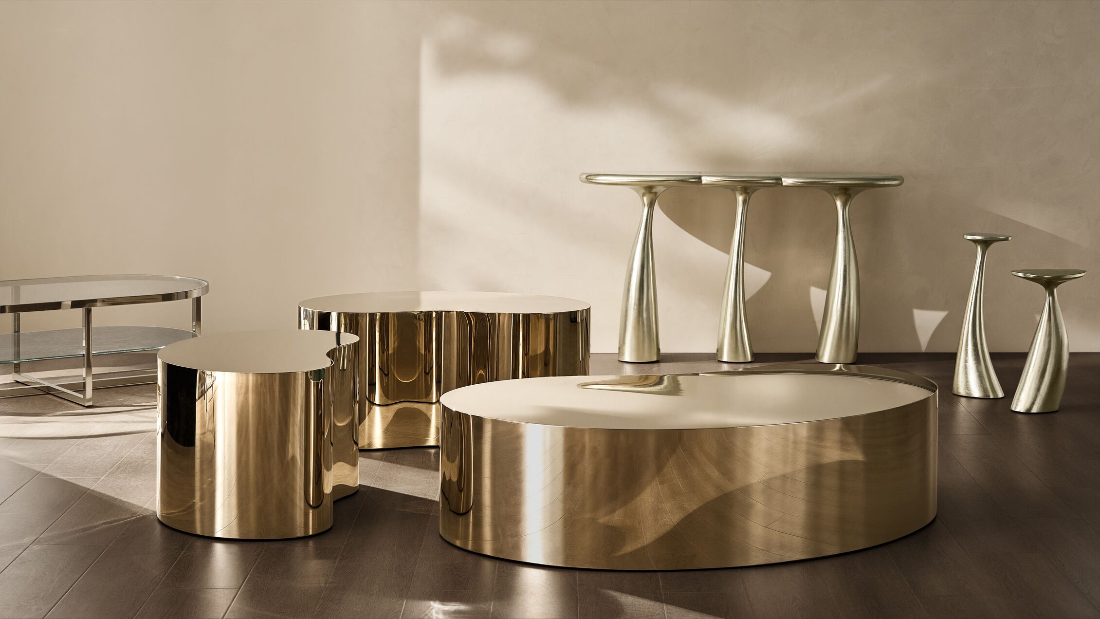 <p style='color:black'>Sculptural furniture finished in radiant gold tones designed to shape atmosphere and reflect light.</p>