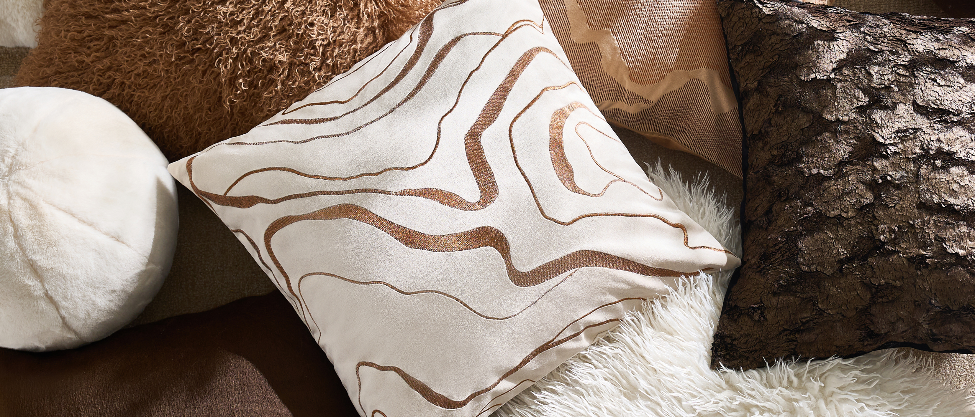 Discover accent pillows that define modern luxury and effortless style.