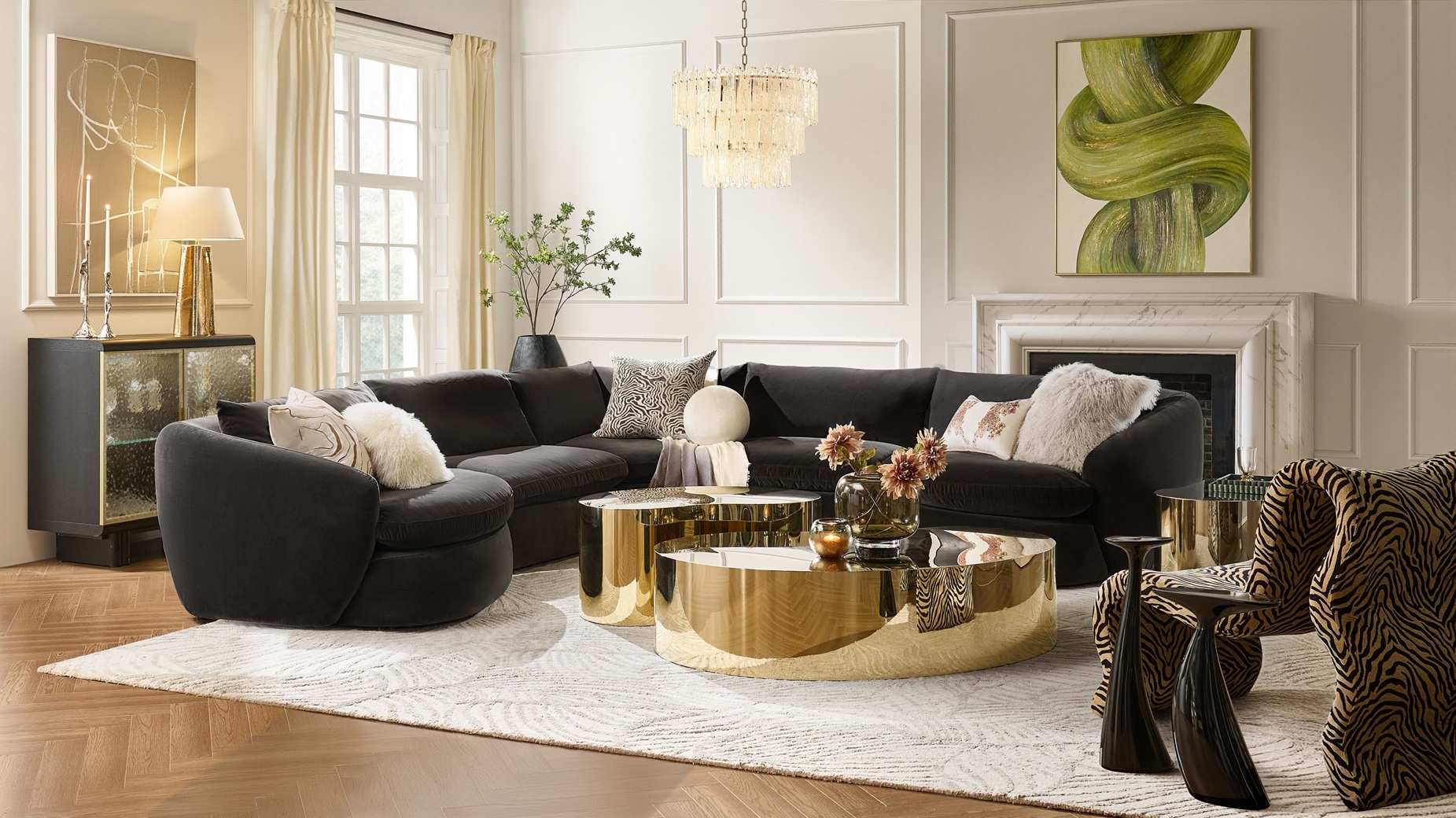 Rounded silhouettes, gilded surfaces, and artful patterning shape a room that feels both elevated and unforgettable.