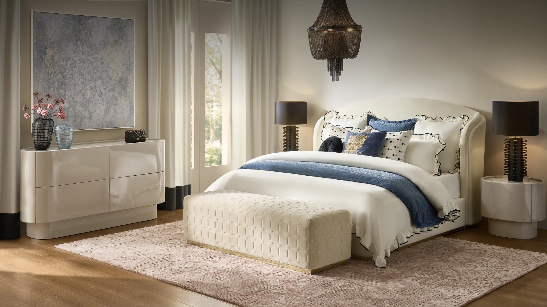 The Indigo Repose Bedroom featuring an elegant cream arched upholstered bed, layered indigo and white bedding, woven storage bench, and glossy modern dresser. title: Shop The Indigo Repose Bedroom