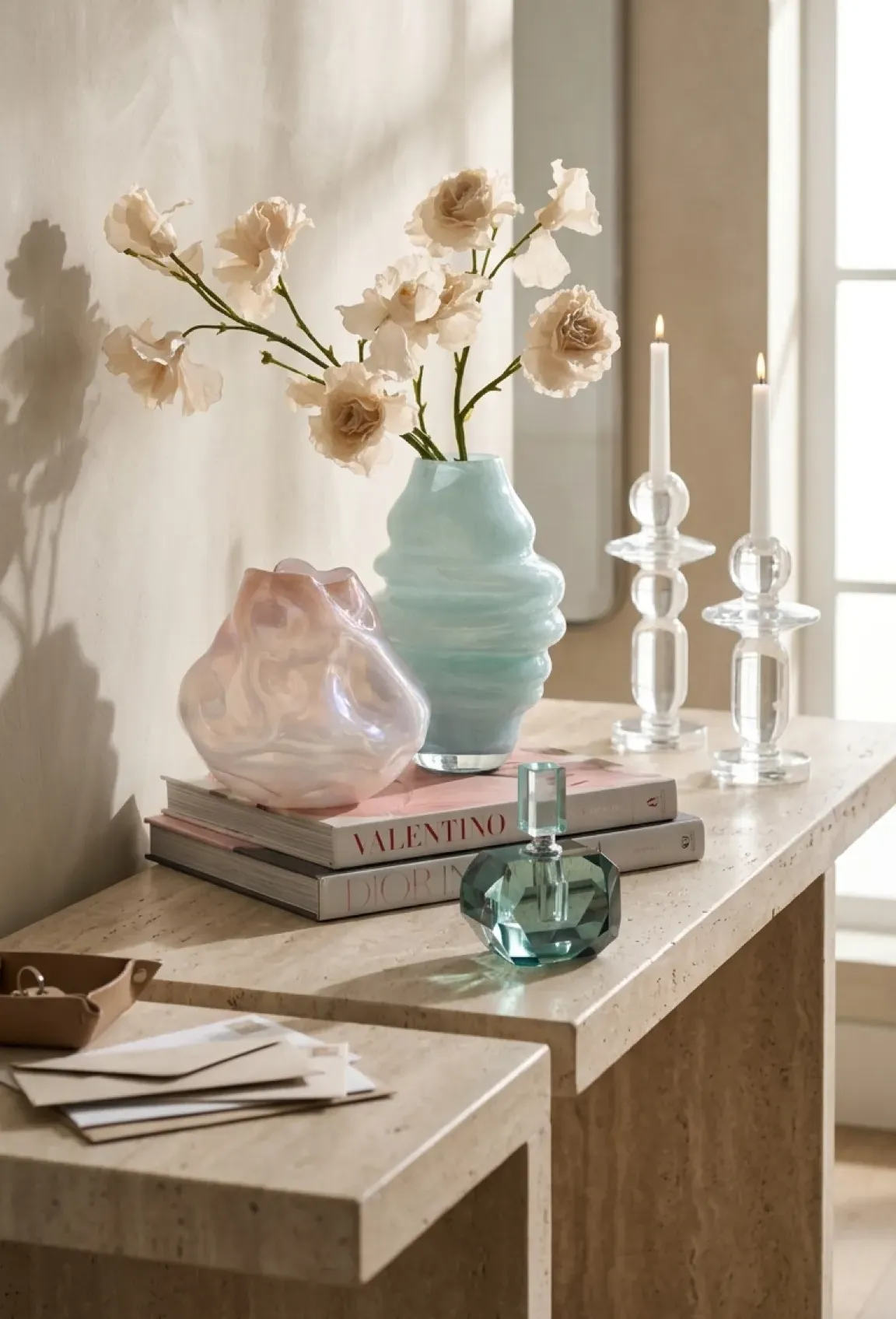 Keepsake gifts for mom styled with florals, decorative boxes, and sculptural home accents.